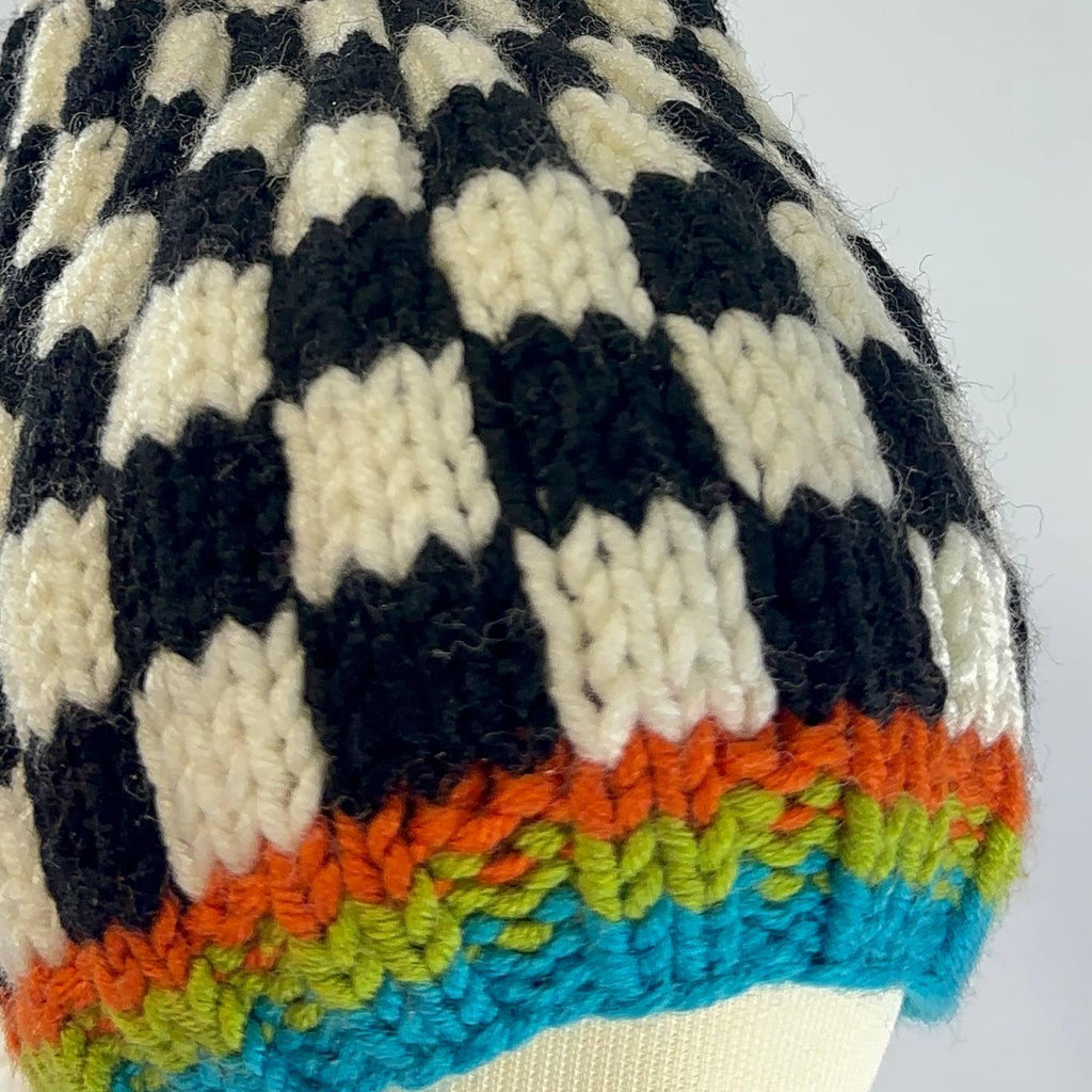 Hand Knitted Baby Vest: Soft White Yarn, Leaf Yoke Design