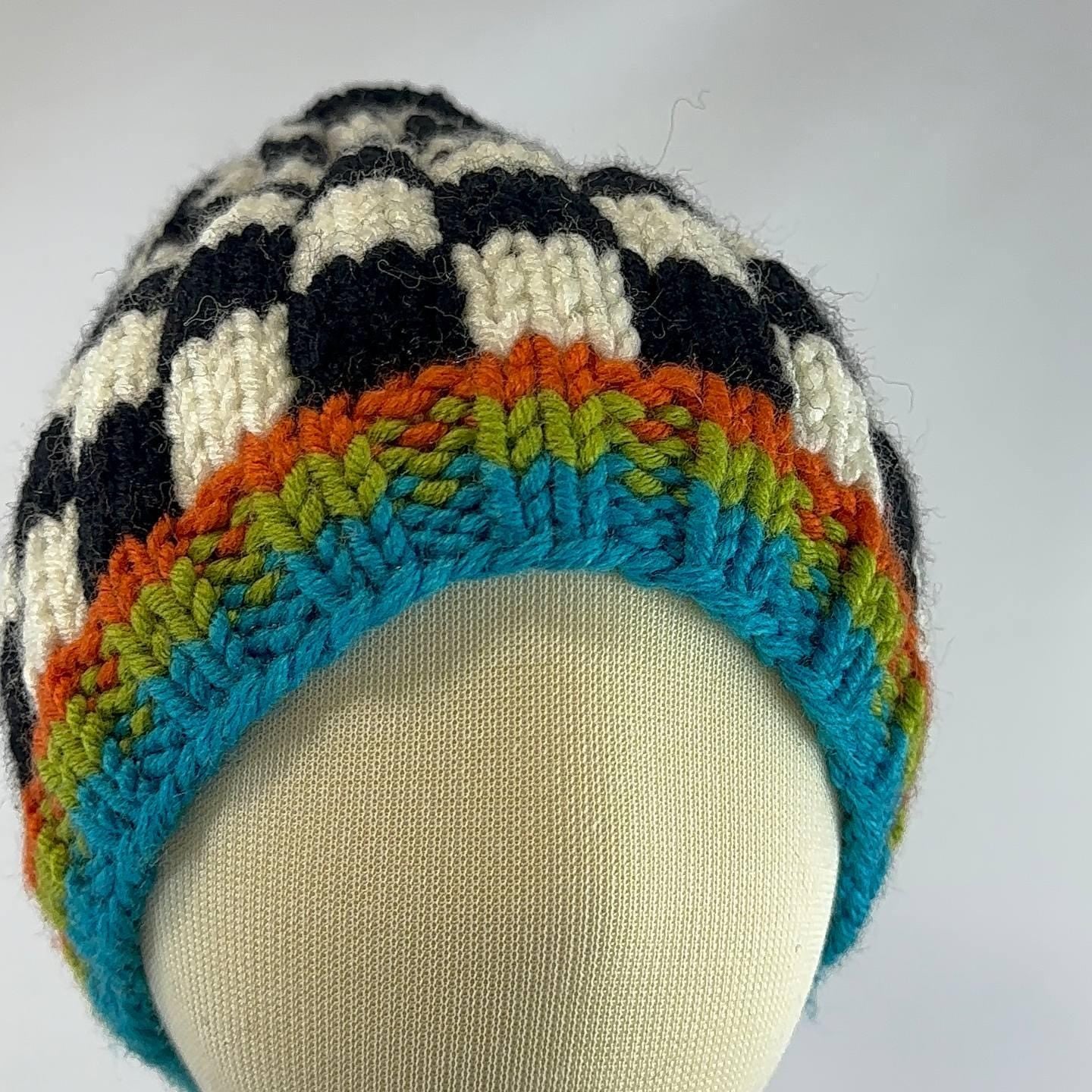 Hand Knitted Baby Vest: Soft White Yarn, Leaf Yoke Design